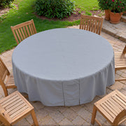 Top view of the Khomo Gear round patio table cover on a paver patio