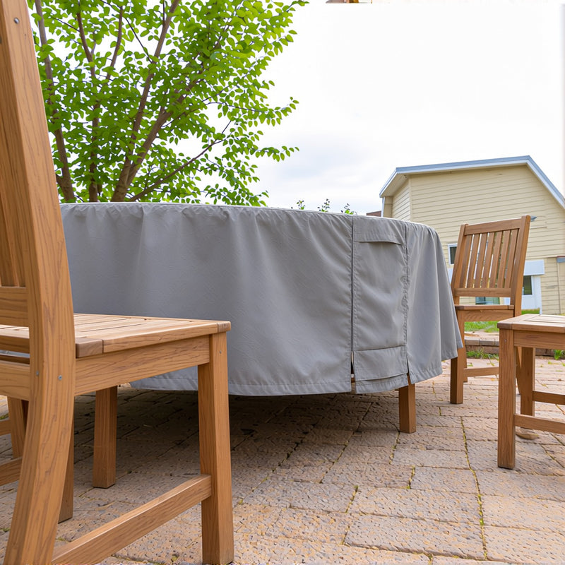 Side view of the Khomo Gear round table cover with a wooden chair in the foreground